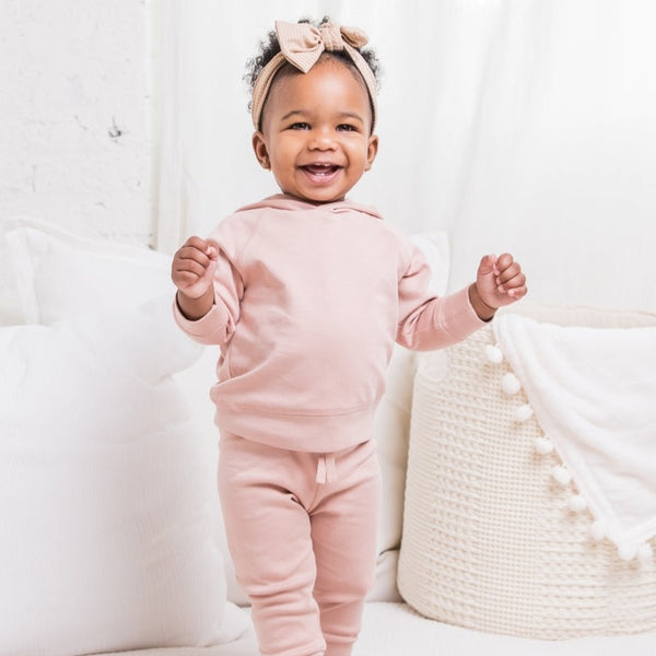 african american toddler in blush cruz organic baby joggers