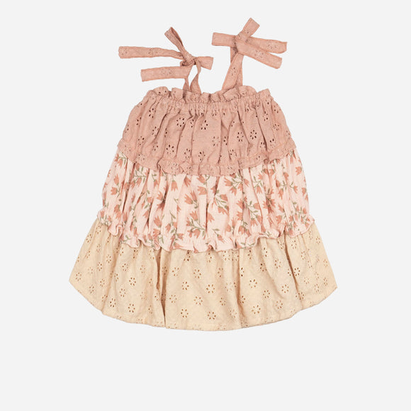 Two-tiered dress with floral pattern on a white background