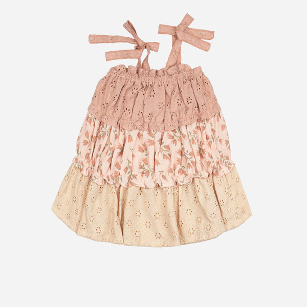 Two-tiered dress with floral pattern on a white background