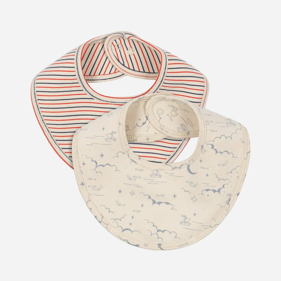 Two baby bibs with striped and patterned designs on a white background