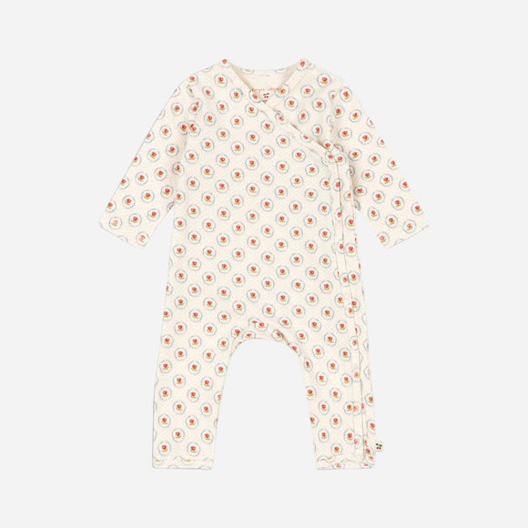 Baby onesie with floral pattern on a white background