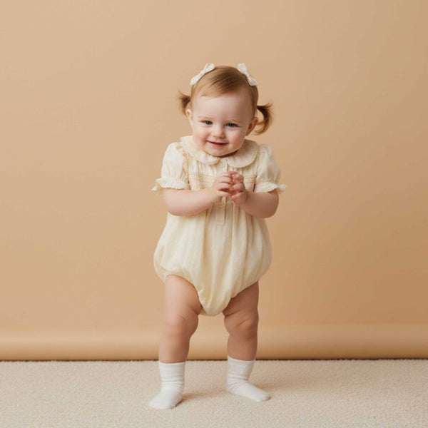 Makemake Organics - Organic Smocked Button Romper - Butter Yellow
