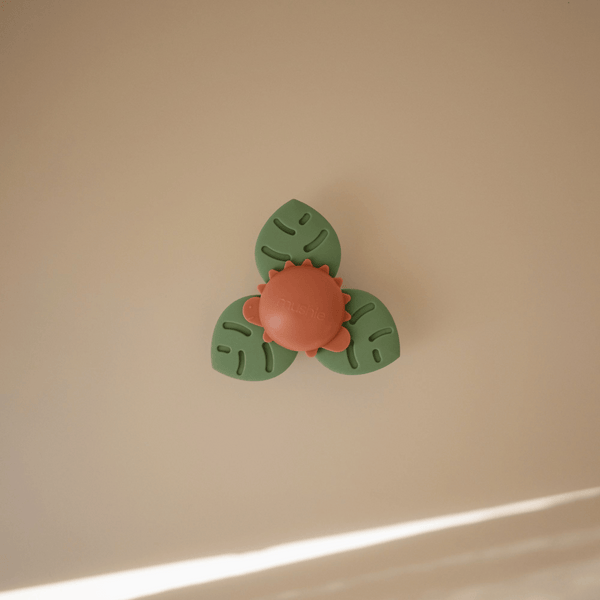Mushie - Dino Suction Spinner Toy