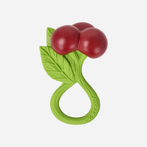 Green teething ring with red cherries on a white background