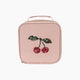 Pink lunch bag with cherry design on a white background