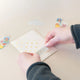 The First Snow - Happy Birthday Balloon Cat with Gold Confetti Card